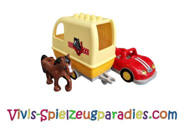 Truck with horse trailer and horse